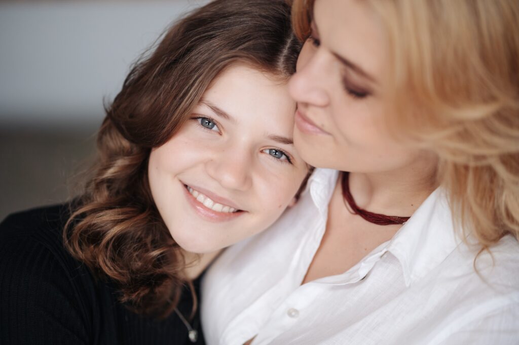 Happy mother and teenage daughter