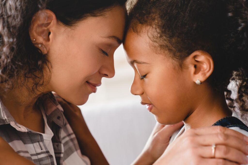 Mother and daughter hugging embracing sharing love and care. Motherhood. Happy Mother`s day!